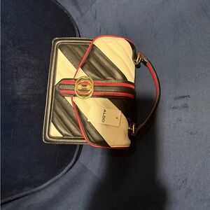 Aldo Black and Cream Striped Handbag with Red Trim